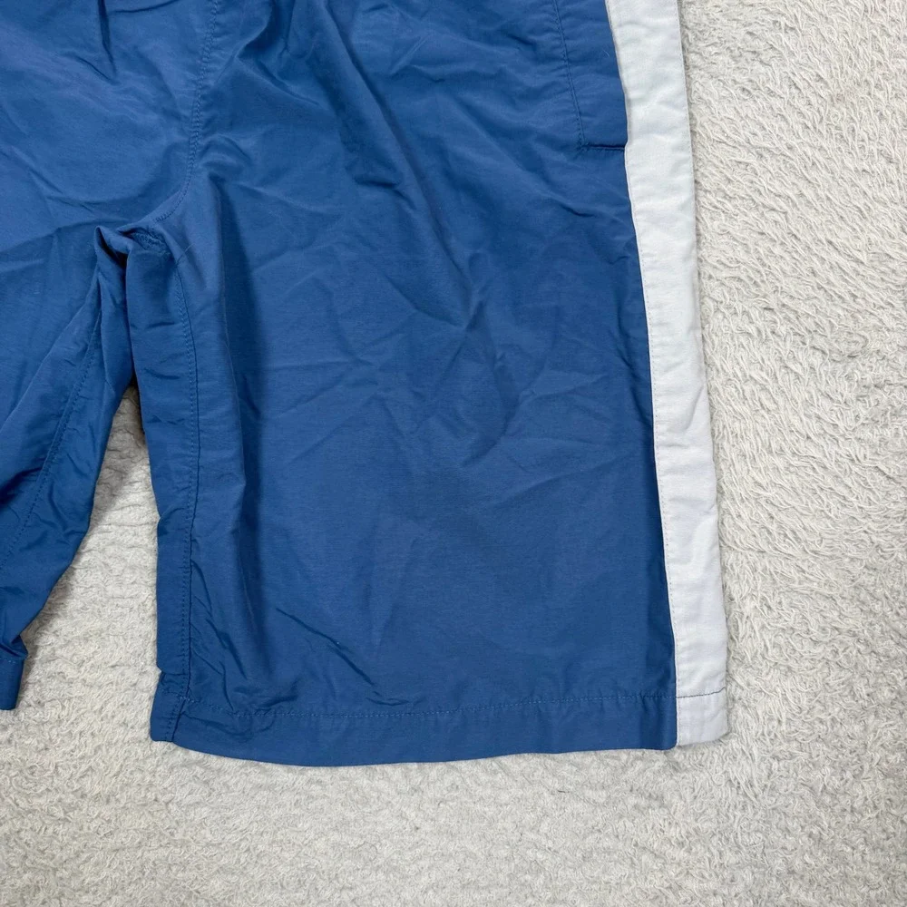 Vintage Nike Boys Blue Nylon Athletic Shorts White Side Stripe Logo Size Medium
